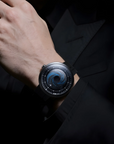 wrist shot CIGA design X LABEL NOIR AUTOMATIC WATCH BLUE PLANET II · BLACK STAR EDITION