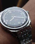 YEMA FLYGRAF Pilot automatic wristwatch with stainless steel bracelet and black dial display style shot.